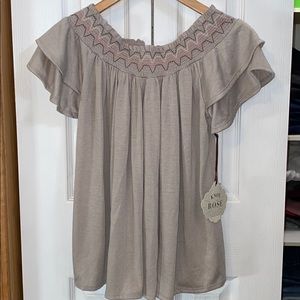 Off-the-shoulder tan flowy blouse